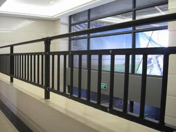 Black steel handrails are installed to protect passengers
